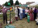 Scarecrows being prepared for judging. Foster Road allotments, 16th August 2003.